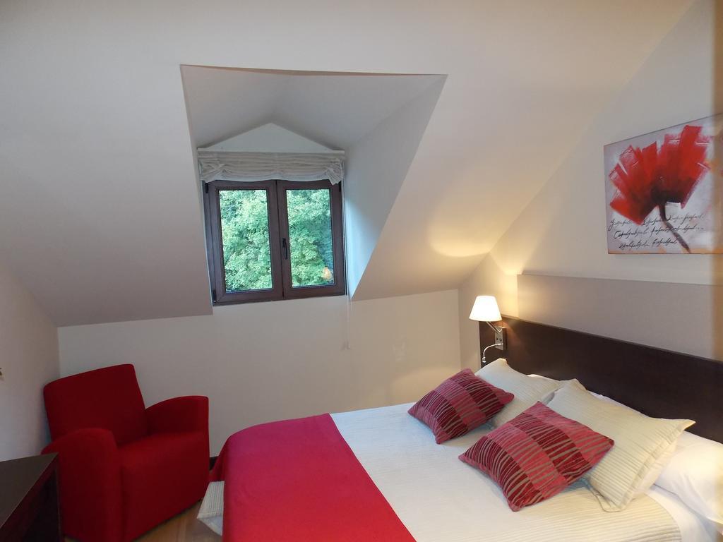 Aparthotel Bubal El Pueyo de Jaca Pokoj fotografie